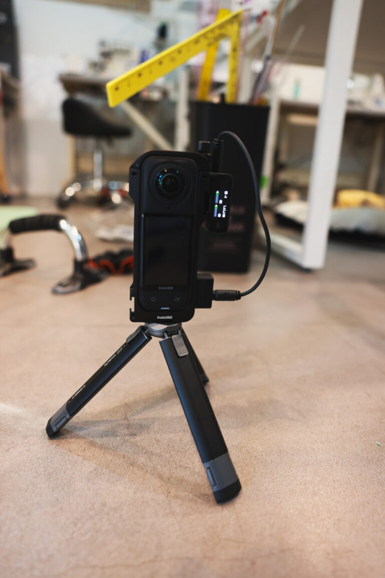 “Screenshot of a WordPress post editor displaying the ‘Bonus Tip: Consider Extra Batteries’ section from an Insta360 X5 Mic Adapter review, with a visible affiliate link to AliExpress.”