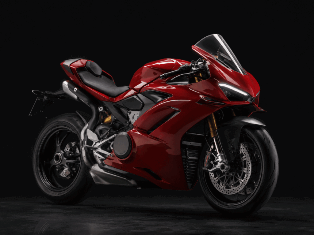 who owns Ducati red Italian superbike studio shot