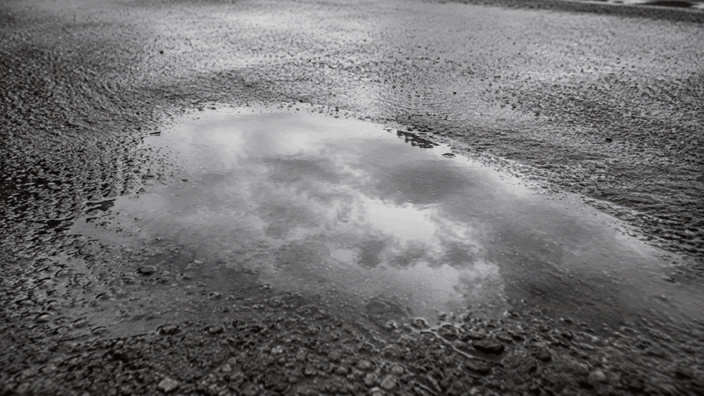standing water as a hidden motorcycle road hazard