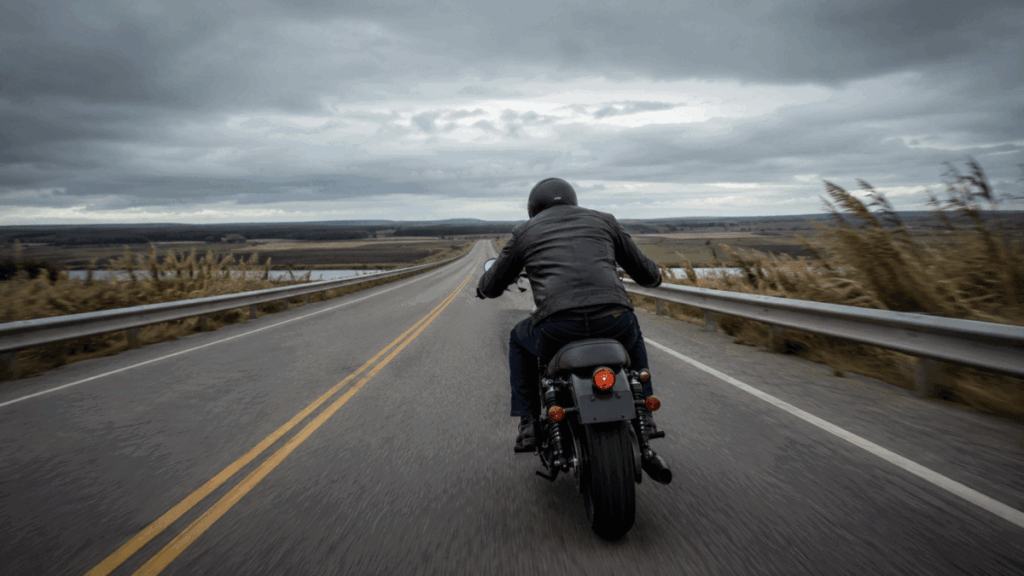 rider handling wind among other motorcycle road hazards