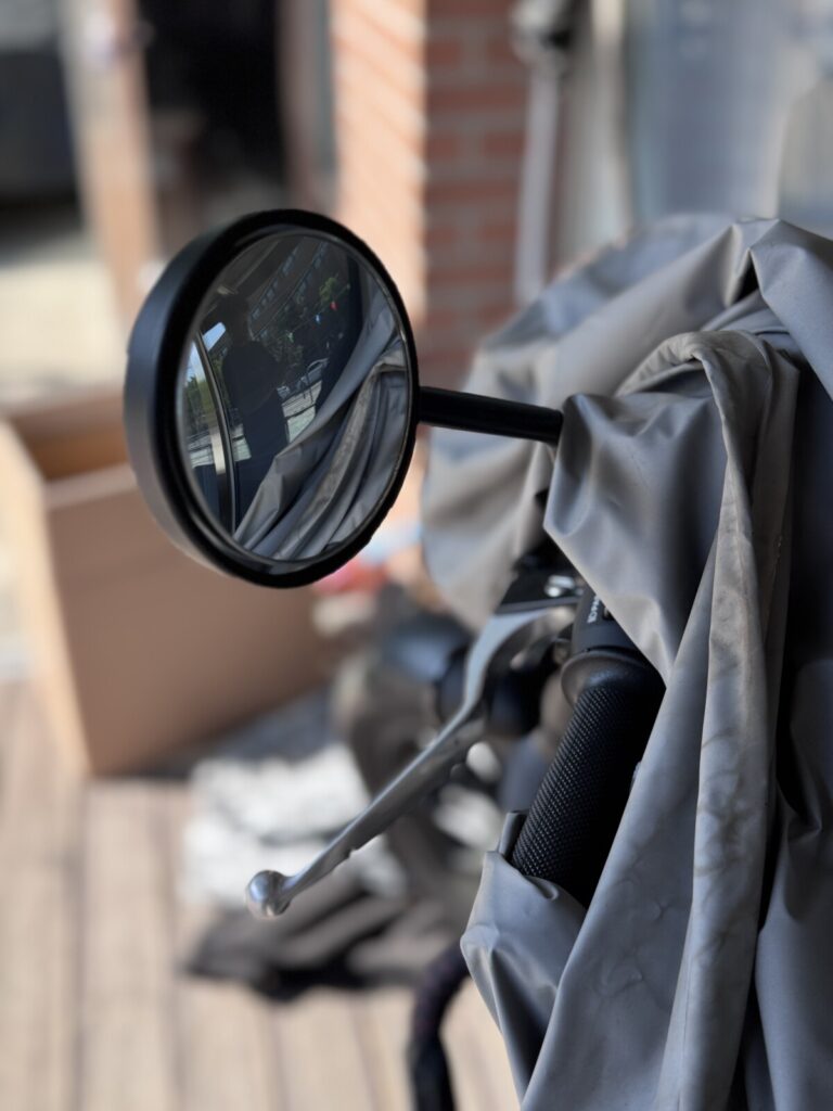 3R blind spot mirror installed on Honda CL500 round mirror — same upgrade used on the Super Cub