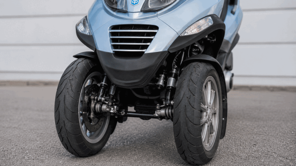 Piaggio MP3 dual front wheels — two contact patches for stability