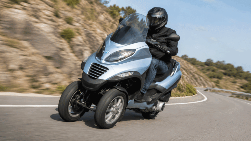 Piaggio MP3 tilting system — parallelogram suspension allows motorcycle-like leaning